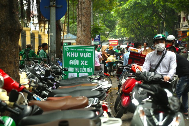 Hà Nội thu phí điện tử không dừng tại toàn bộ bãi đỗ xe từ 1/7- Ảnh 1. Hà Nội thu phí điện tử không dừng tại toàn bộ bãi đỗ xe từ 1/7- Ảnh 1.