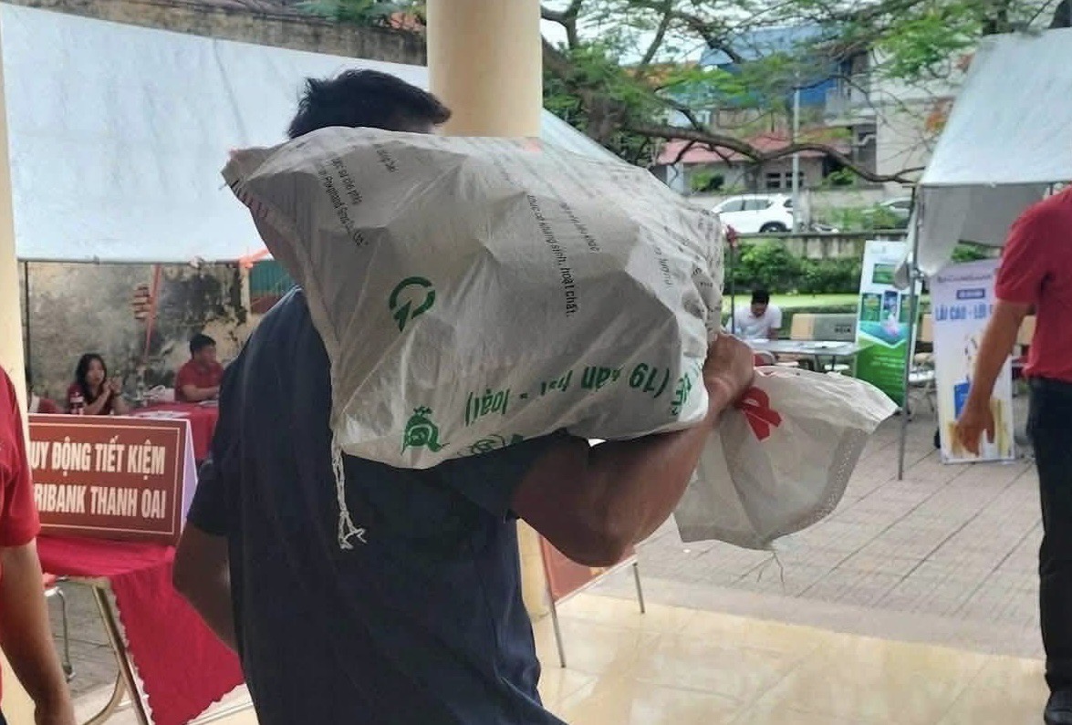 Người dân Hà Nội mang bao tải đi đựng tiền: Tiết lộ mức giá đền bù dự án Olympic- Ảnh 1.