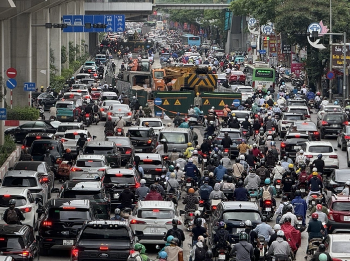 Hà Nội dự kiến chưa cấm xe máy xăng tại vùng lõi từ 1-7- Ảnh 1.
