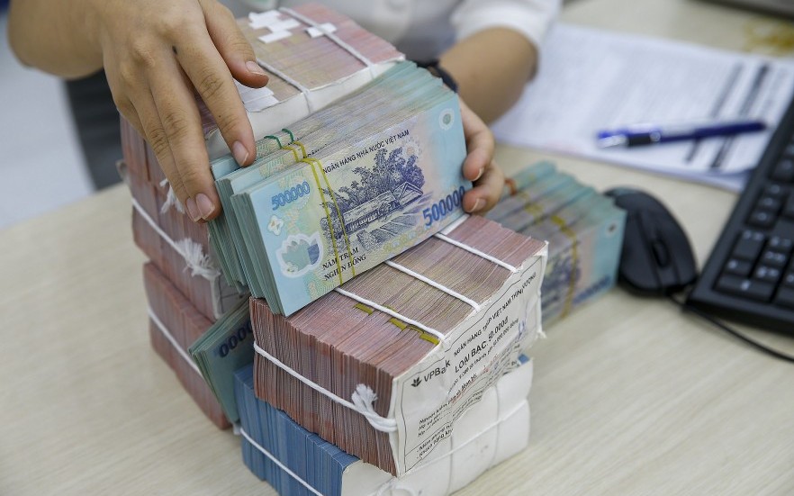 hoạt động giao dịch tại các ngân hàng thương mại ảnh Đức Thanh