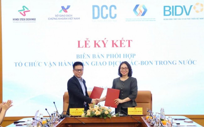 Ký kết phối hợp vận hành sàn giao dịch các-bon trong nước Ký kết phối hợp vận hành sàn giao dịch các-bon trong nước