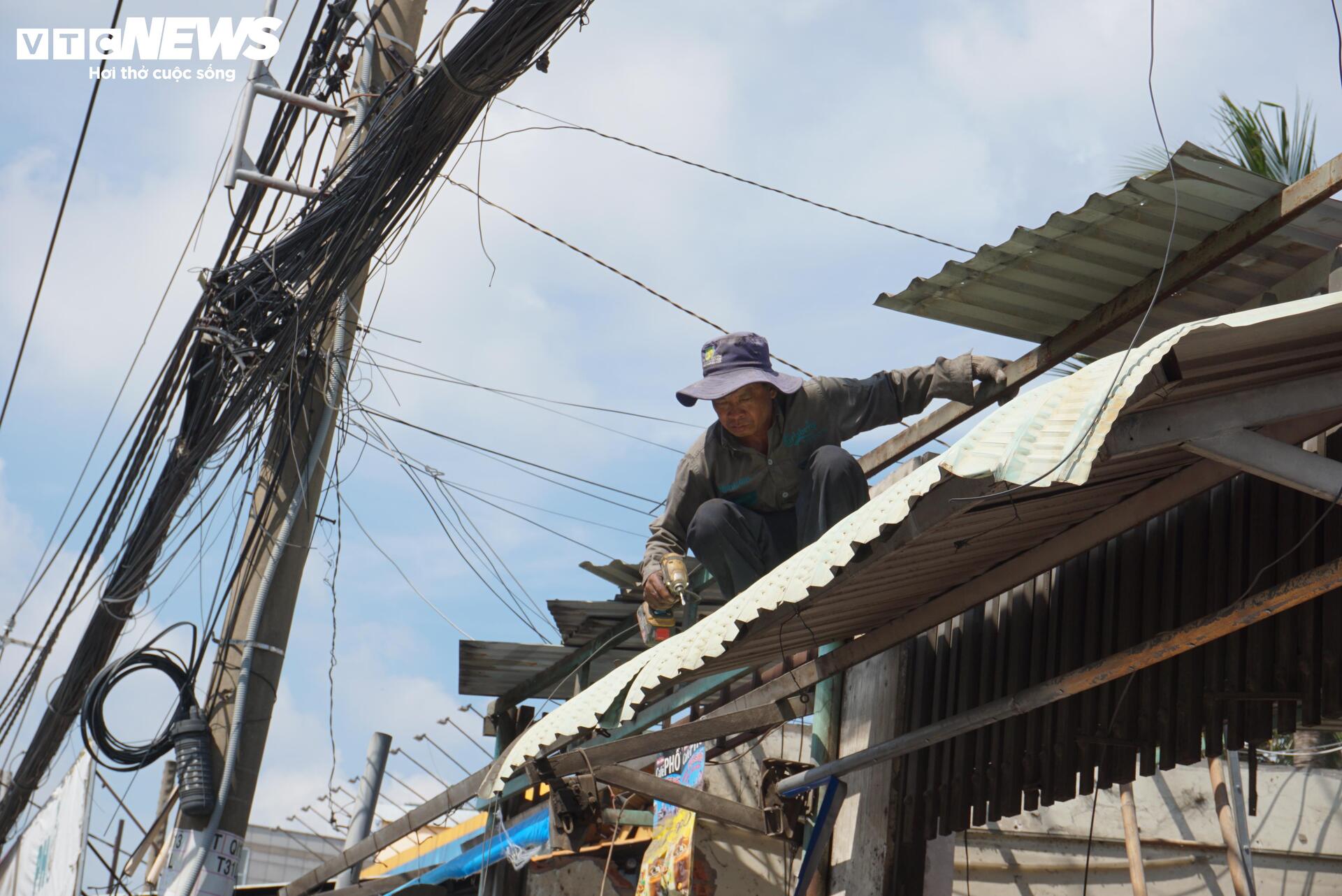 Chợ Bình Triệu và 200 hộ dân hoàn tất trả mặt bằng mở rộng Quốc lộ 13- Ảnh 20.