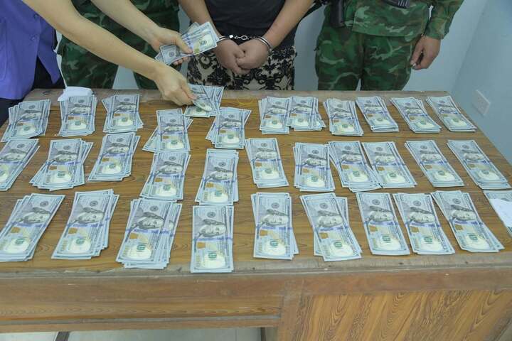 Lạng Sơn: Bắt người vận chuyển gần 400 tờ 100 USD nghi tiền giả vào nội địa- Ảnh 2.